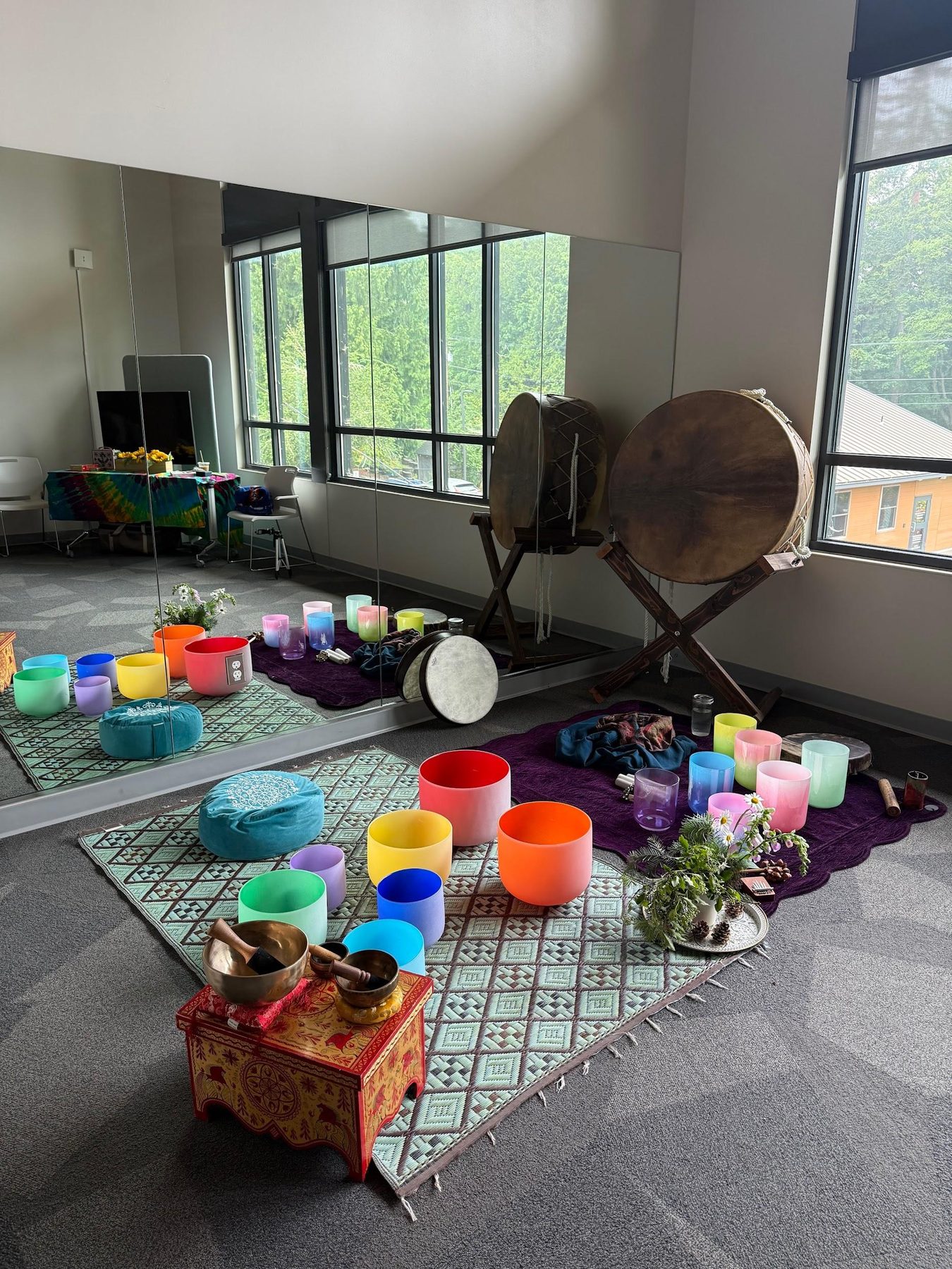 Rainbow crystal singing bowls and ceremonial drums