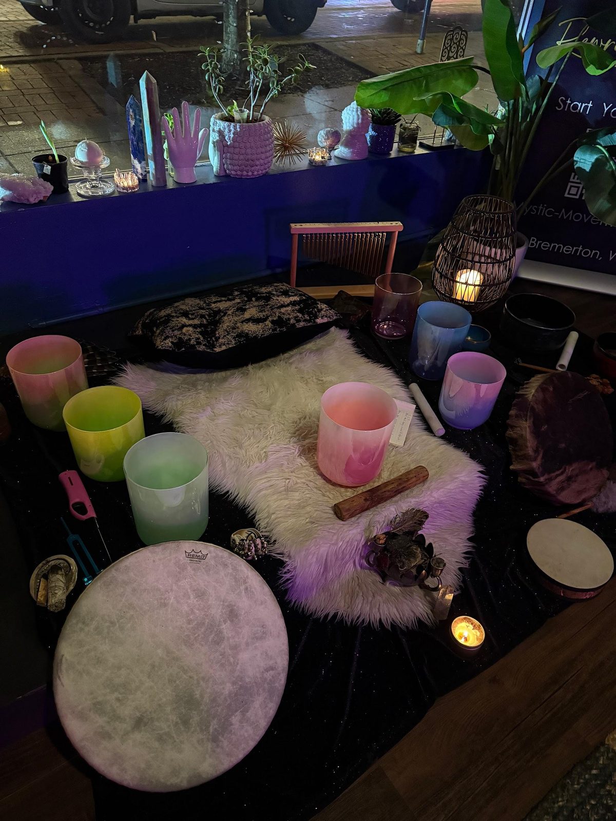 Ceremonial sound bath with crystal bowls, drum and candles